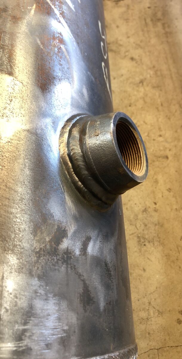 Socket weld on a threaded outlet